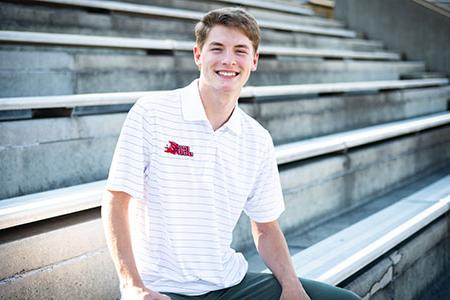 A student sitting in JSU Stadium